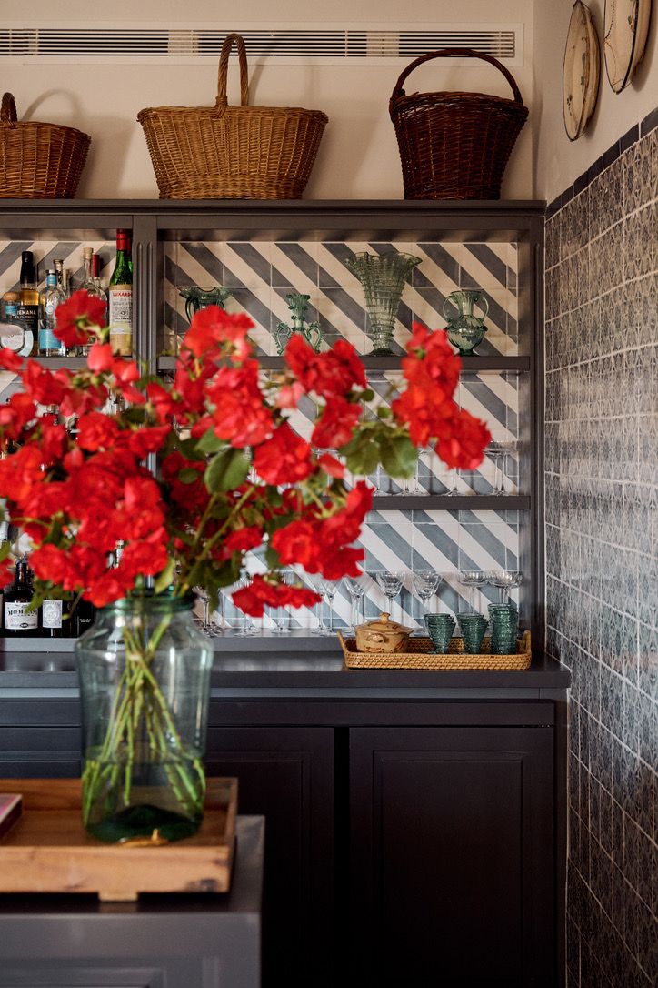 The bar with its striped tiles and glassware
